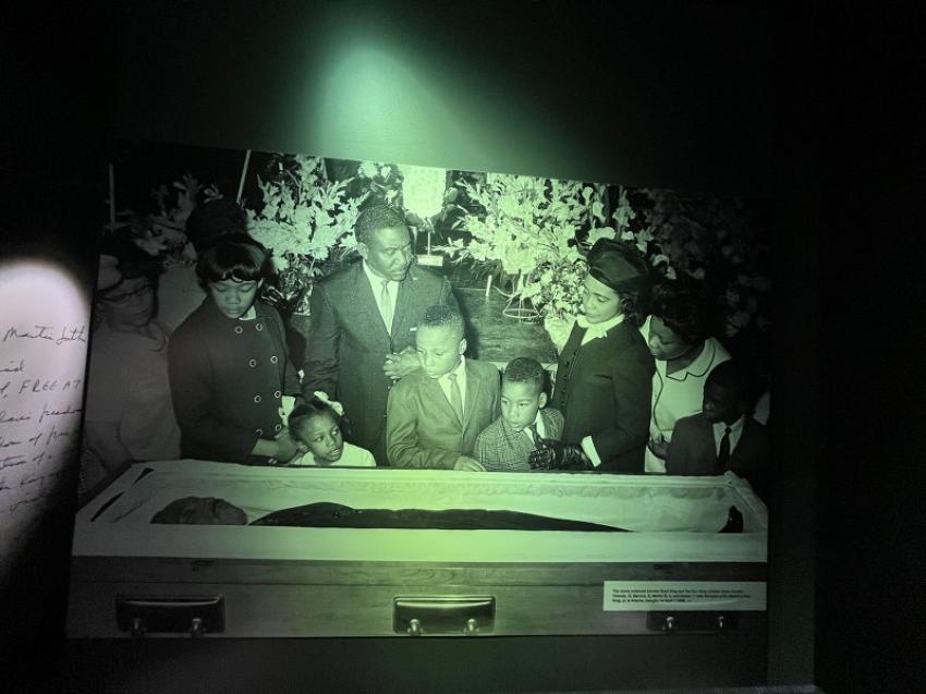 An exhibit of Martin Luther King in the coffin at his funeral after he was assassinated by a White man on April 4, 1968.  

