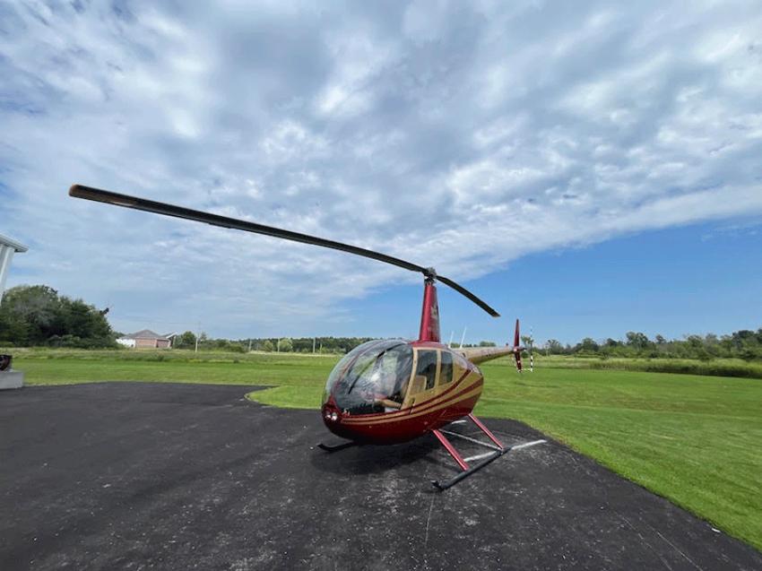 A helicopter poised for take-off over the spectacular Thousand Islands. Photo: Sujoy Dhar