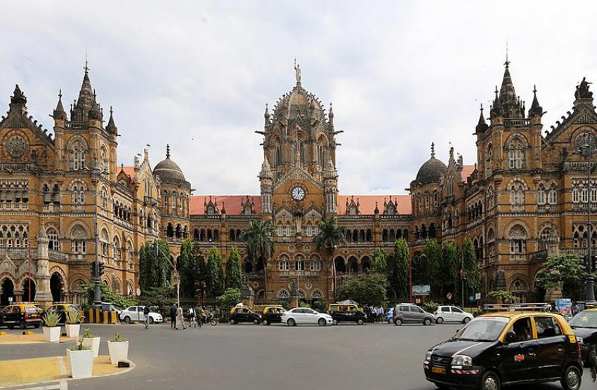At Chhatrapati Shivaji Maharaj Terminus, the historic clock crowns the Gothic facade, quietly keeping time amid the ceaseless rhythm of Mumbai’s busiest railway hub. Photo: Wikipedia Creative Commons